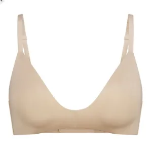 59. Skims WIRELESS FORM T-SHIRT DEMI BRA in clay size 36A