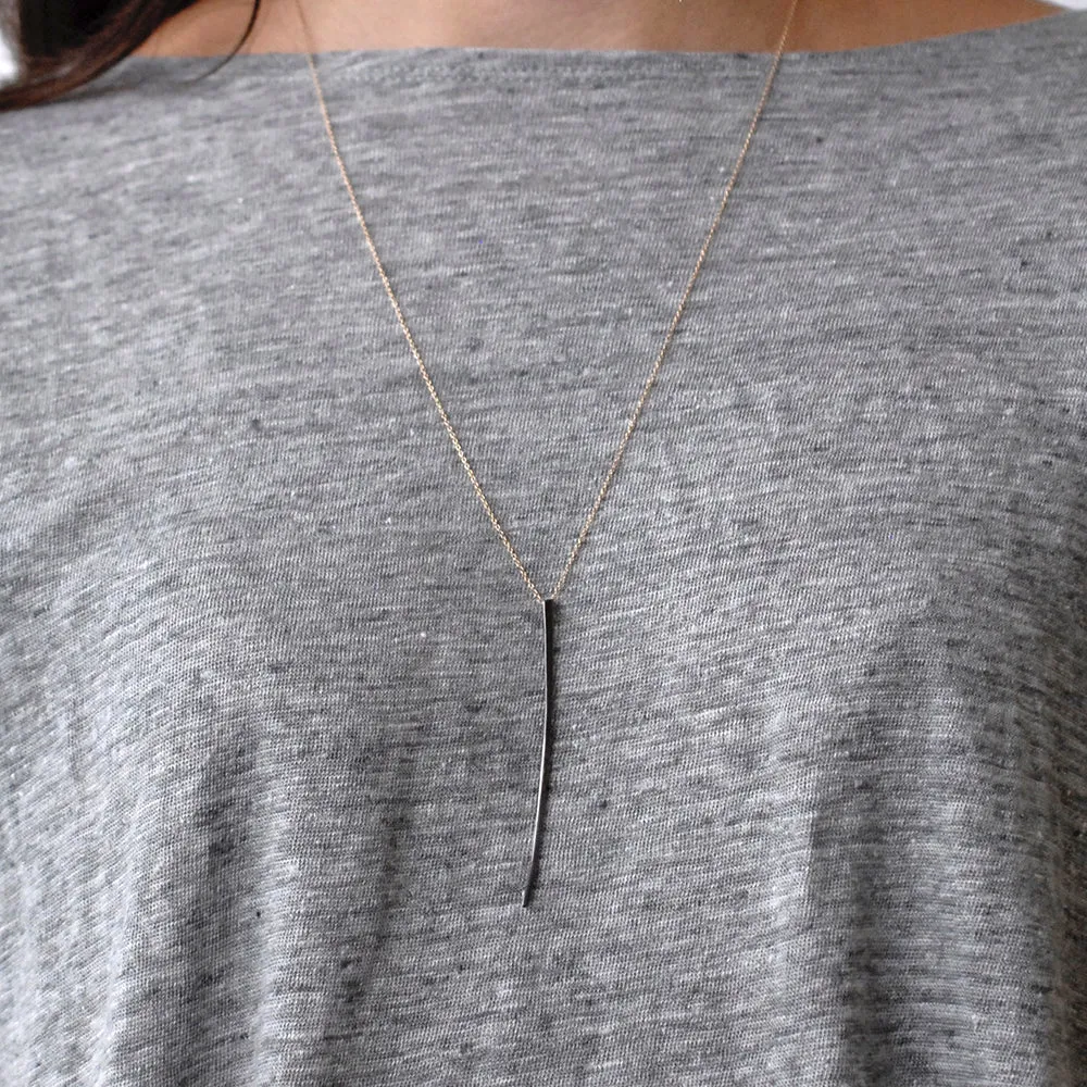 curved stake pendant