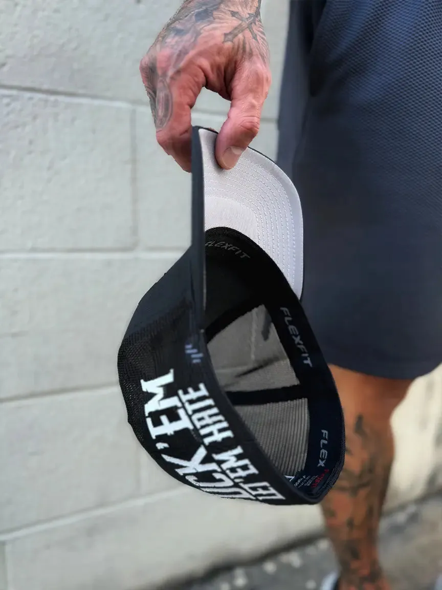 LET EM HATE SIDE STYLE FLEXFIT HAT