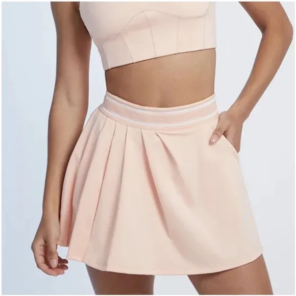 NWT Free People movement Round Robin skort in color peaches