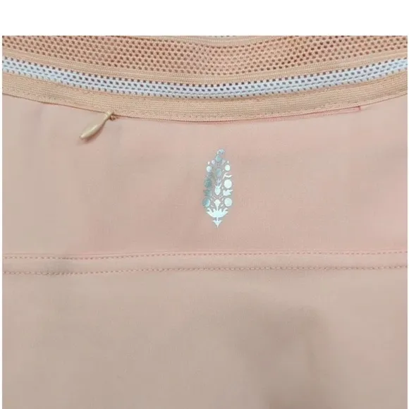 NWT Free People movement Round Robin skort in color peaches