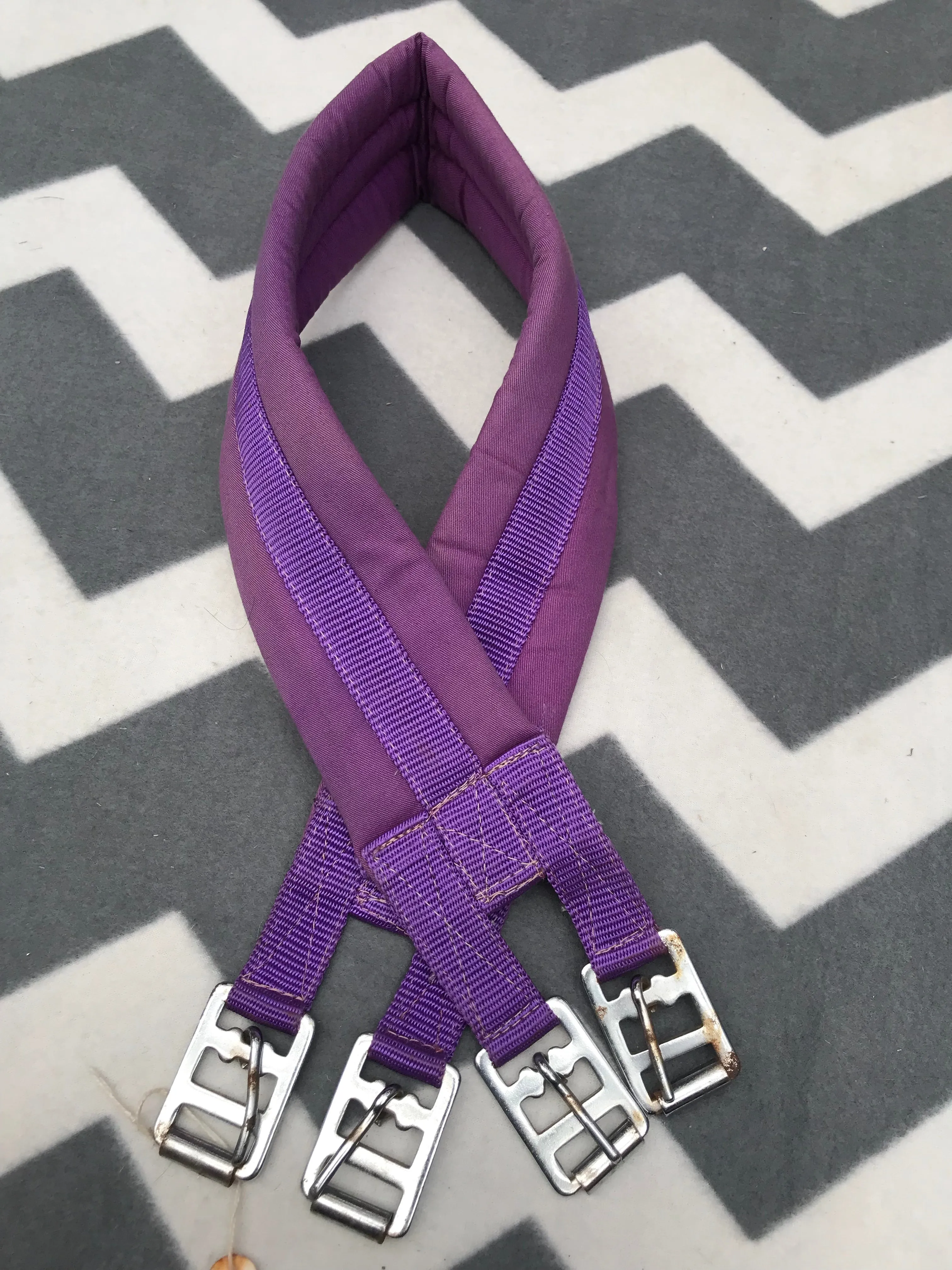 Purple padded material girth 39”