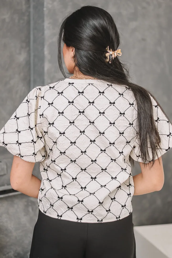 Take A Bow Textured Top