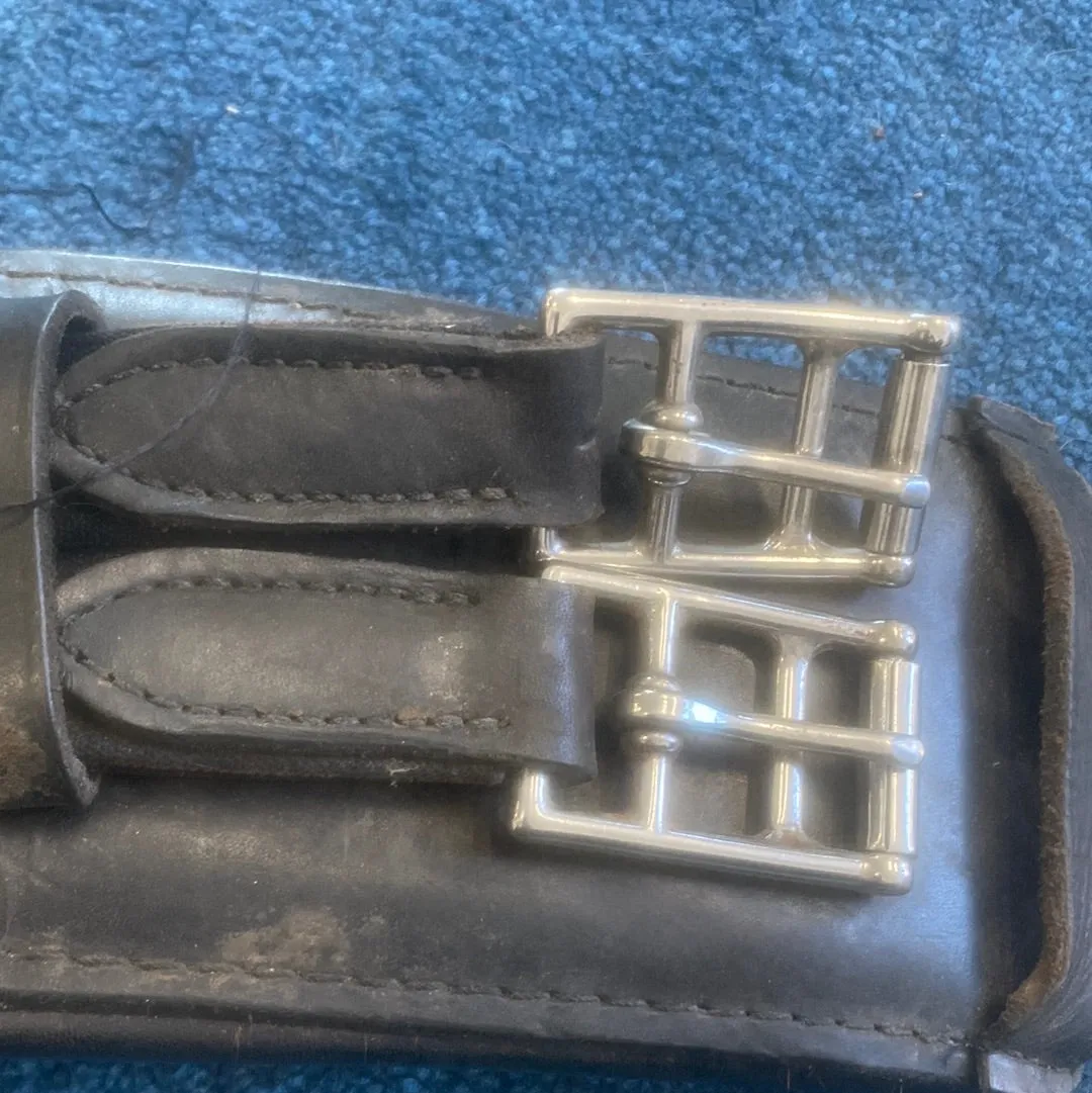 Used black leather 20" dressage girth